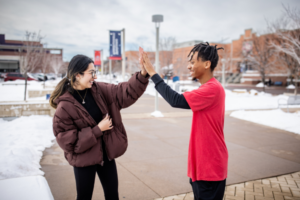 MSU Denver students high-fiving